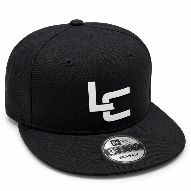 Product mockup of a black New Era 9FIFTY snapback with a white 3D silicone LC logo